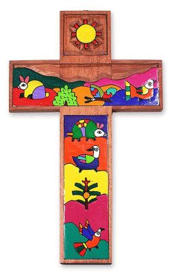 Cross with animals and shrubs.